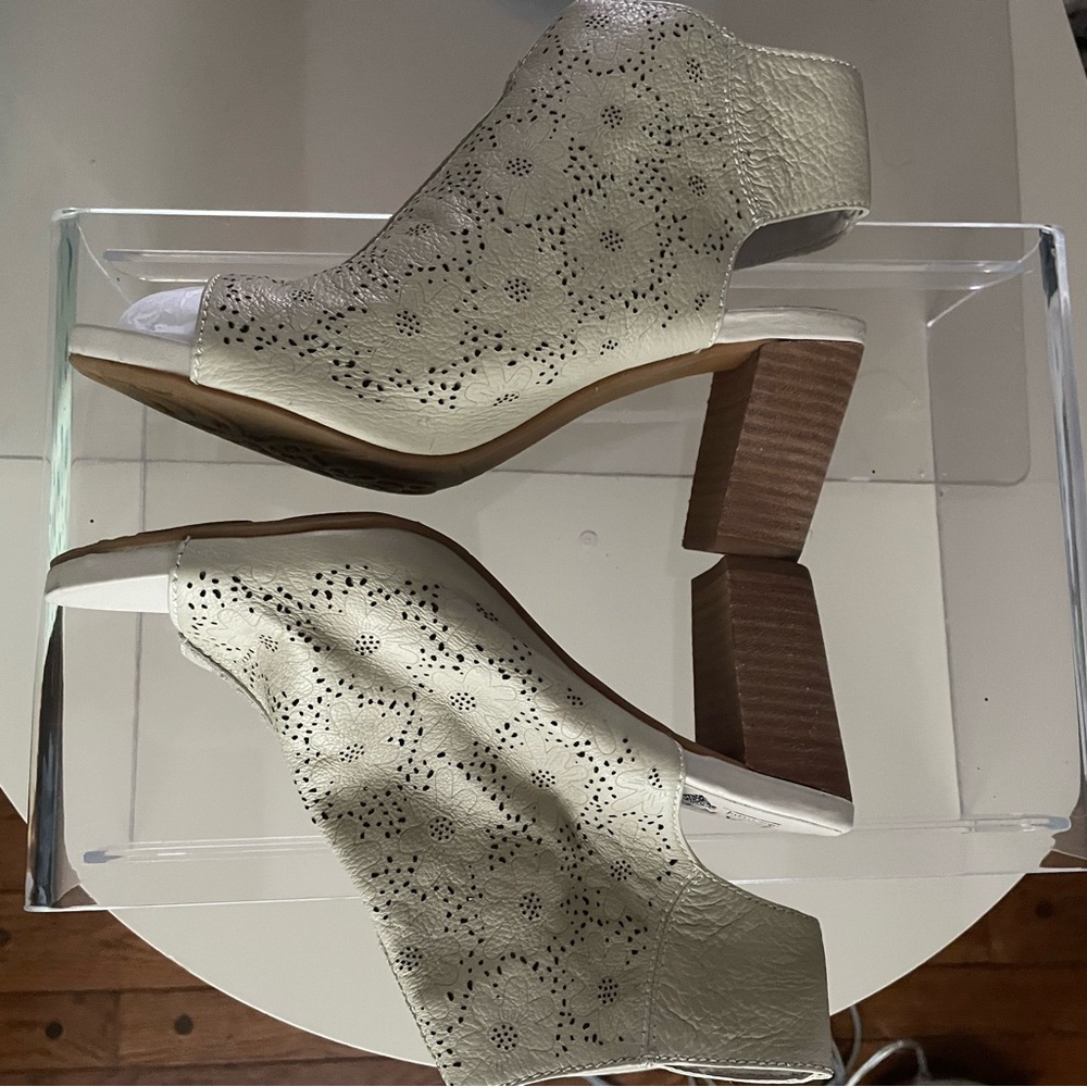 Sandals with pizzazz. New without tags. Leather and lovely